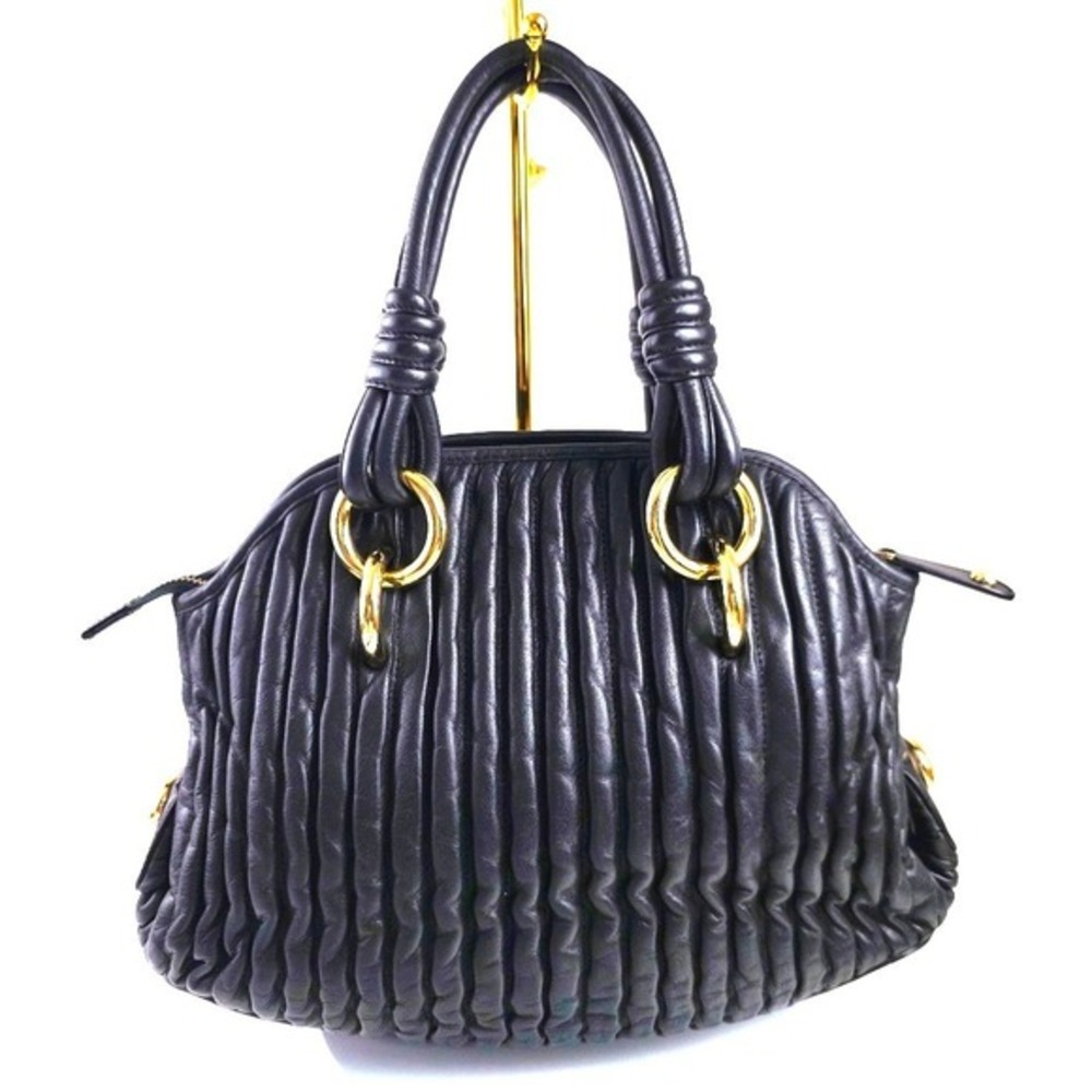 Bally Quilted Leather Domed Satchel Handbag Black Gold Purse Classic Quiet Luxur